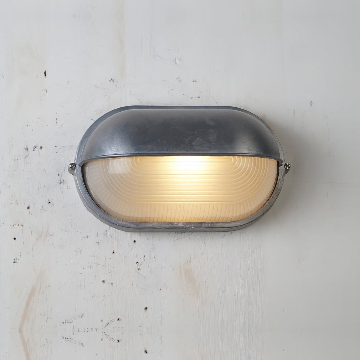 Outdoor Industrial Wall Light with Oval Bulkhead Design and Ribbed Glass Diffuser - Image 46