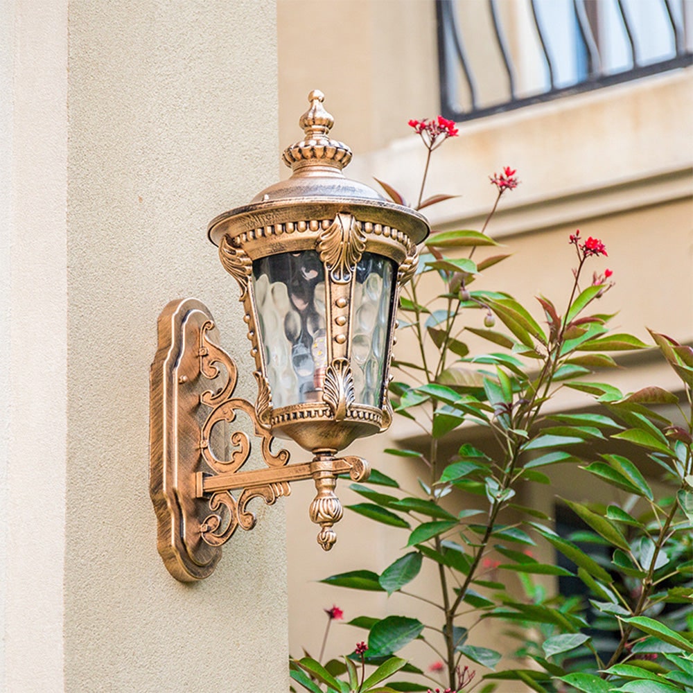 Outdoor Wall Sconce with Antique Brass Finish and Textured Glass Lantern Design - Image 3