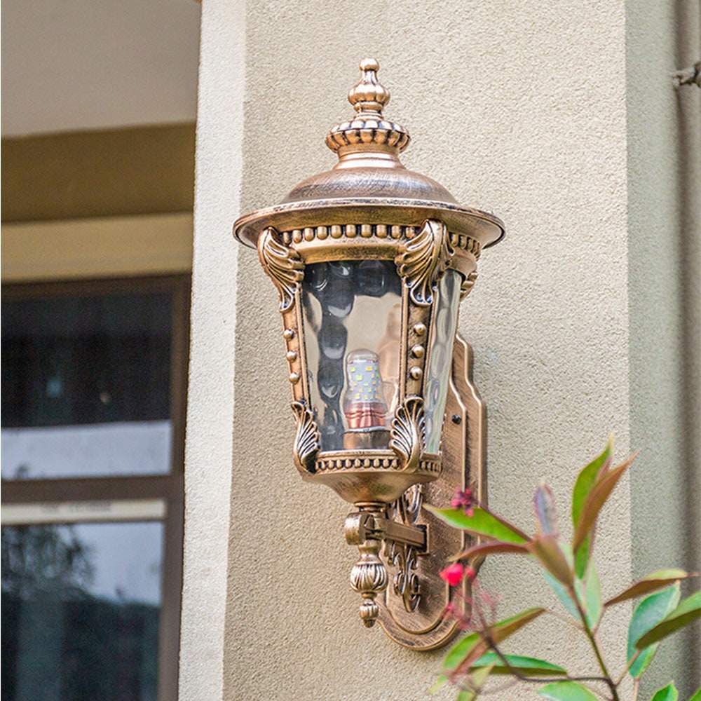 Outdoor Wall Sconce with Antique Brass Finish and Textured Glass Lantern Design - Image 4
