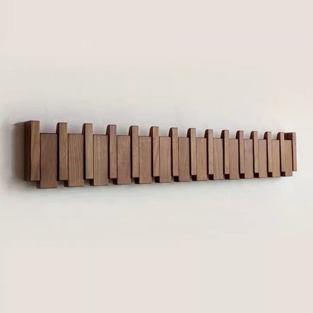 Wall Coat Rack with Foldable Hooks and Retractable Piano Key Design - Image 1