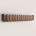 Wall Coat Rack with Foldable Hooks and Retractable Piano Key Design - Image 1
