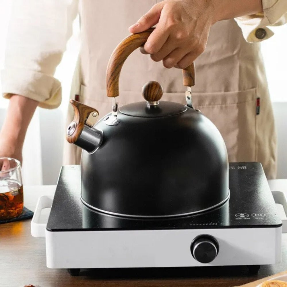 Whistling Kettle Tea with Wood-Grain Handle and Stainless Steel Stovetop Design - Image 5
